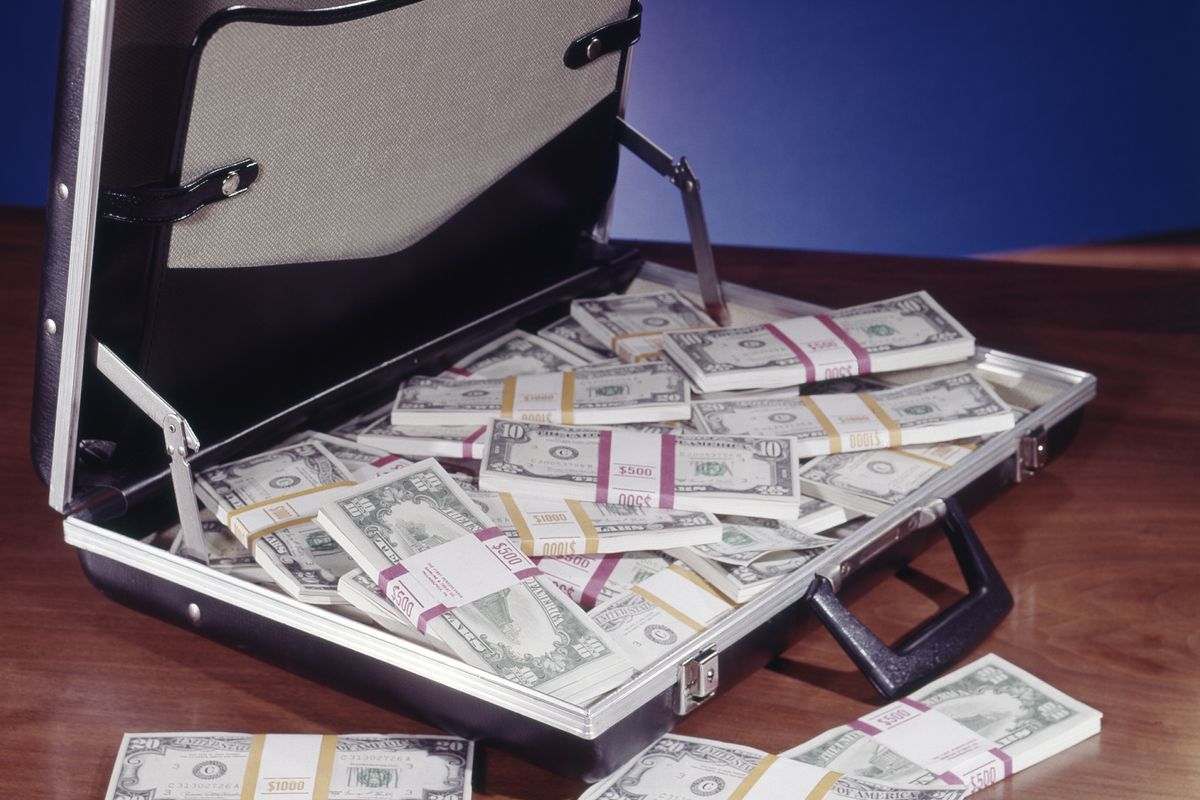 Briefcase filed with money