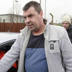 Seamus Daly is photographed as he leaves Maghaberry prison, in Ballinderry, Northern Ireland, Tuesday, March, 1, 2016.  The Real IRA veteran accused of murdering 29 people in Omagh had all charges dropped Tuesday after prosecutors concluded that the evidence against him — particularly a witness supposed to place him in the Northern Ireland town that day — was too weak. Seamus Daly has spent nearly two years in prison awaiting trial for the Aug. 15, 1998, car bomb attack on a crowd of shoppers, workers and tourists.  