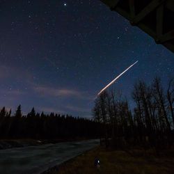 This Monday, Feb. 23, 2015, ten second time exposure photo provided by Neil Zeller, shows a streak of light from what is believed to be a Chinese rocket burning up upon re-entry, in the atmosphere as seen from Calgary, Canada. People from Arizona to Canada have reported seeing bright lights in the sky as the Chinese rocket burned up in the atmosphere. Witnesses described the lights as a group of about three dozen fireballs moving slowly from south to north late Monday.