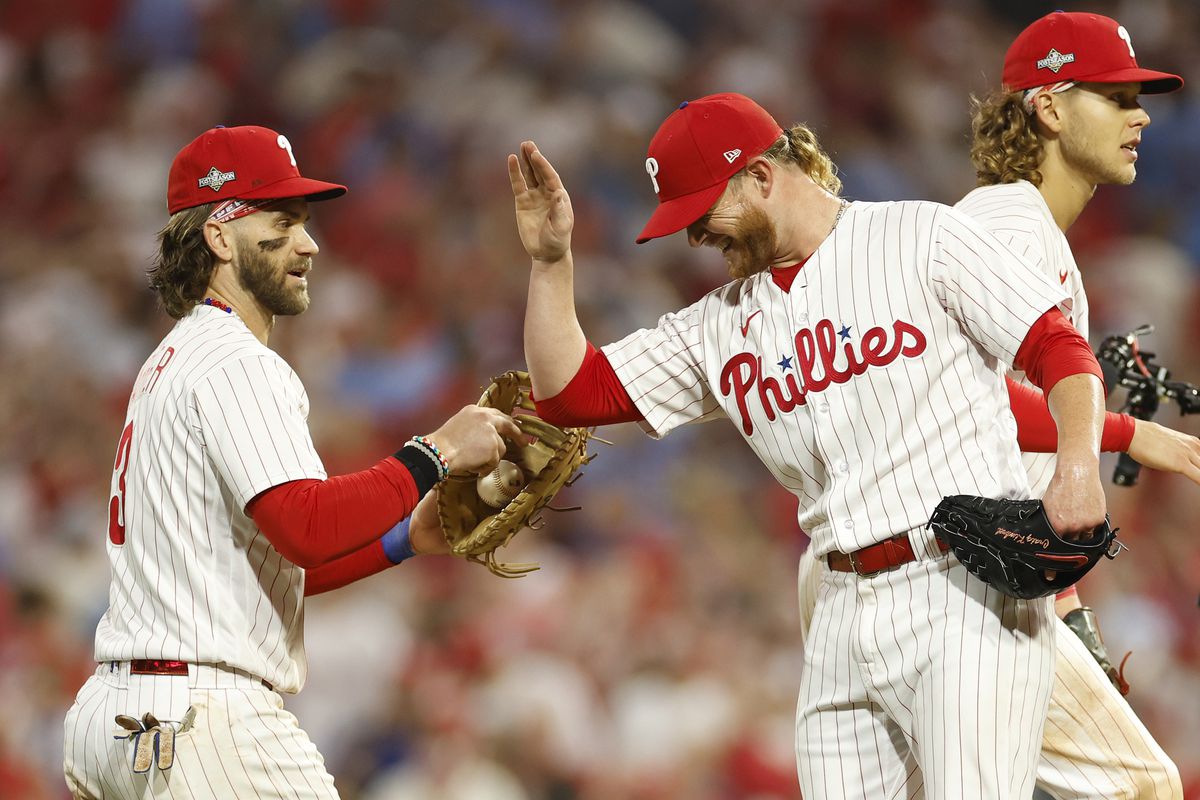 Bryce Harper of the Philadelphia Phillies celebrates with Craig Kimbrel after defeating the Miami Marlins 4-1 in Game One of the Wild Card Series at Citizens Bank Park on October 03, 2023 in Philadelphia, Pennsylvania.