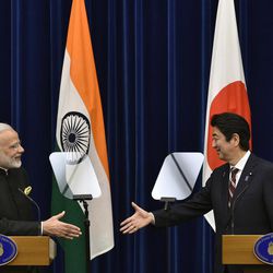Indian Prime Minister Narendra Modi, left, and Japanese Prime Minister Shinzo Abe shake hands  joint press conference at Abe's official residence in Tokyo, Japan, Friday, Nov. 11, 2016. After their bilateral meeting, both leaders signed a civilian nuclear cooperation agreement that will allow Japan to export nuclear plant technology to India. 
