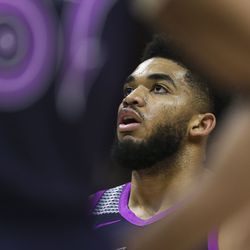 Minnesota Timberwolves center Karl-Anthony Towns (32) shoots the ball after being fouled by the Utah Jazz at Vivint Smart Home Arena in Salt Lake City on Thursday, March 14, 2019.