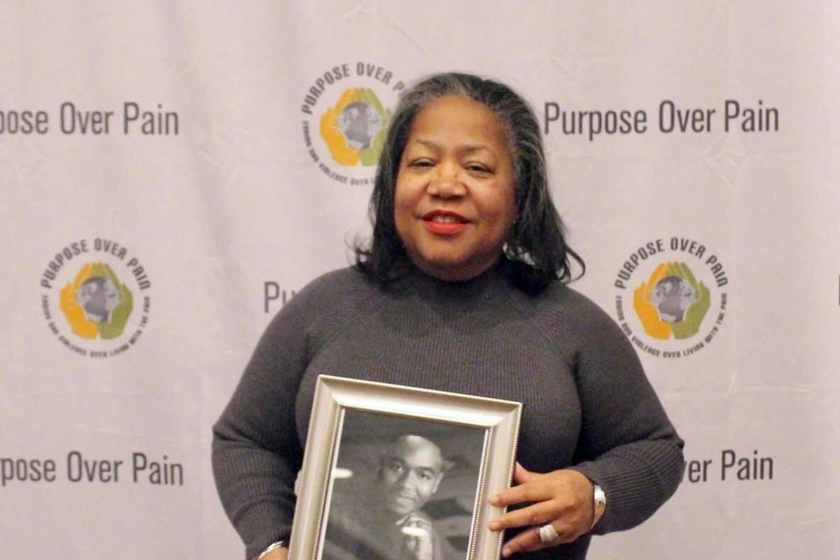 Brenda Mitchell holds a photograph of her son Kenneth Mitchell, who was killed in 2005 in south suburban Matteson.