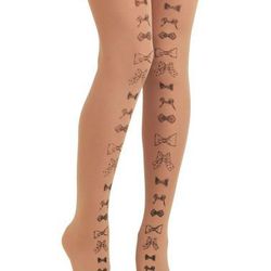 <a href="http://www.modcloth.com/shop/tights/tights-with-bow-line-in-nude">Bow tie tights at Modcloth</a>, $19.99