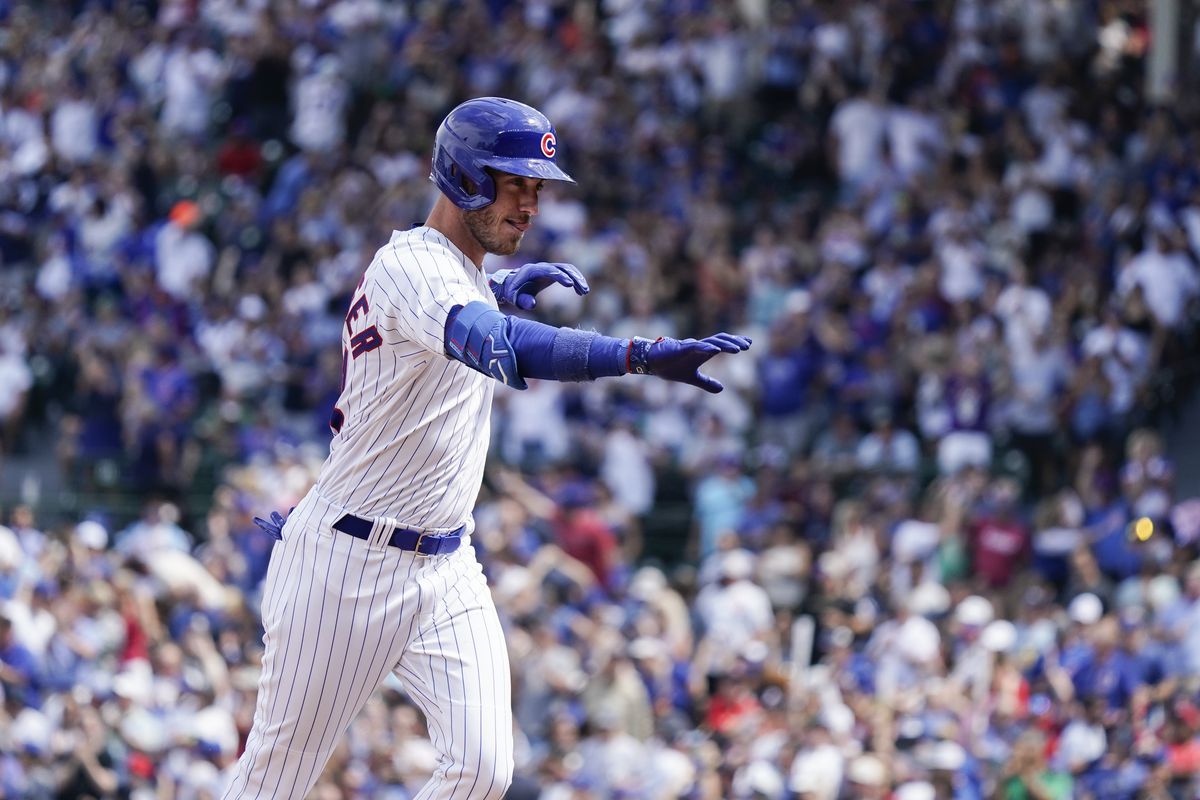 Cody Bellinger of the Chicago Cubs hits a home run during the third inning of a game against the Kansas City Royals at Wrigley Field on August 19, 2023 in Chicago, Illinois.