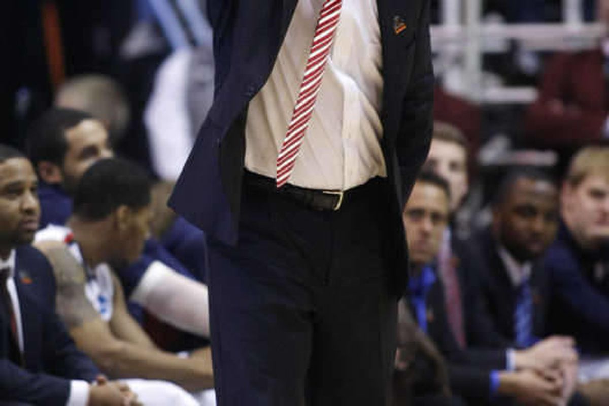 Arizona's Head Coach Sean Miller yells out instructions to his players as Arizona and Harvard play Saturday, March 23, 2013 in the third round of the NCAA tournament in Energy Solutions arena. Arizona won 74-51.