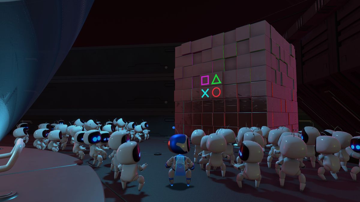 Astro Bots crowd around a PlayStation monument in Astro’s Playroom