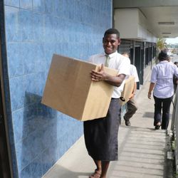 In response to a request from the Fiji Ministry of Health, members of The Church of Jesus Christ of Latter-day Saints in Suva compiled 600 hygiene kits on Tuesday, Feb. 23. Above, missionaries delivered the kits, shipped to Northern Lau and Gau in Fiji, to the Fiji Ministry of Health.
