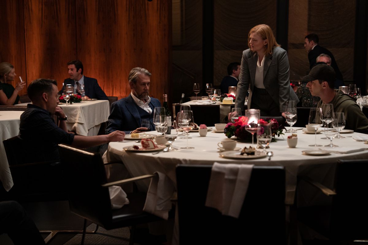 The Roy siblings at a table in Sucession’s final season.