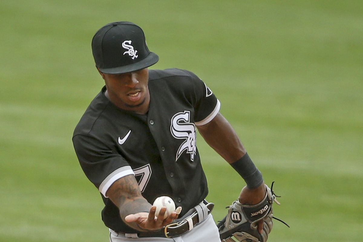 Chicago White Sox shortstop Tim Anderson displays the ball he caught on a line drive by Minnesota Twins third baseman Luis Arraez in the eighth inning at Target Field.