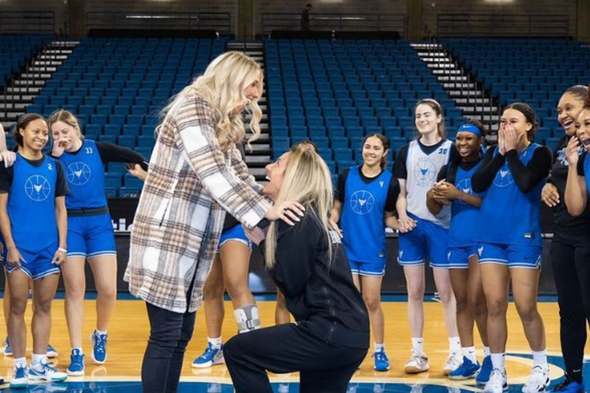 Becky Burke, right, proposes to Savanah Lesesne. 