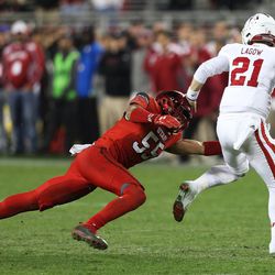Utah Utes linebacker Kavika Luafatasaga (55) chases Indiana Hoosiers quarterback Richard Lagow (21) in the last seconds of the game as the Utes go on to defeat the Hoosiers in the Foster Farms Bowl in Santa Clara, California, on Wednesday, Dec. 28, 2016.