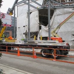 Flatbed with concrete forms for installation