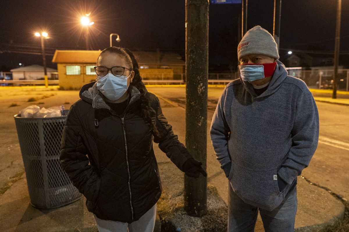 Brenda Correa, 16, and Gonzalo Garcia speak into a camera Tuesday for a GoFundMe campaign near the scene where Garcia was attacked by students while he was selling food. Correa is helping Garcia by setting up a GoFundMe to help cover costs related to the attack.