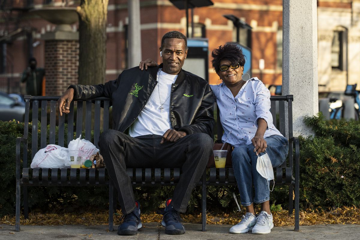Mary Graham, 65, of Cabrini-Green and Rene Dickerson, 58, of Downstate Springfield, sit in Seward Park on the Near North Side on Monday afternoon, still celebrating. “This is quite simply Black history,” said Graham.  | Ashlee Rezin Garcia/Sun-Times