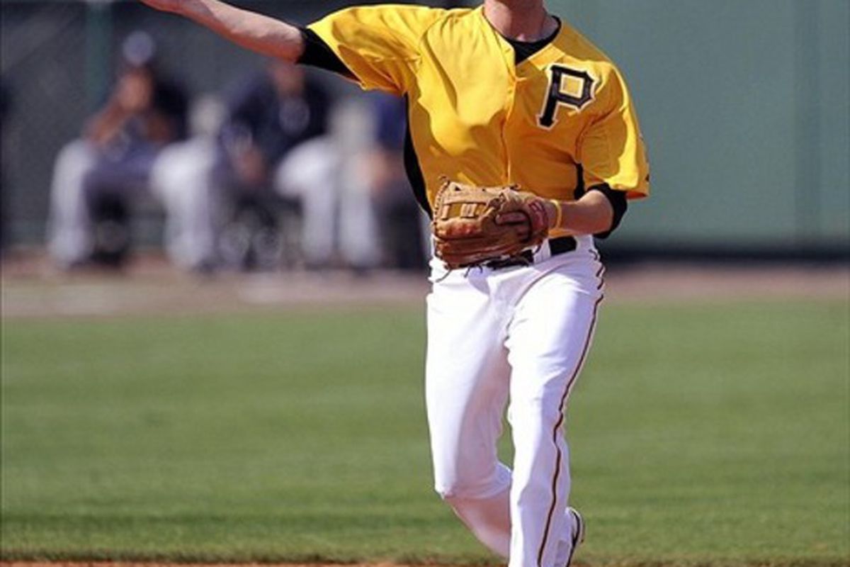 March 6, 2012; Bradenton, FL, USA; Pittsburgh Pirates shortstop Jordy Mercer (69) throws over to first base during a spring training game against the New York Yankees. Joy R. Absalon-US PRESSWIRE
