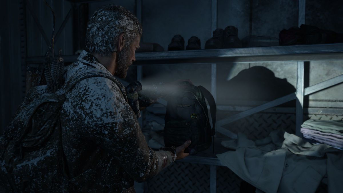Joel finding Ellie’s backpack in the Cabin Resort section of The Last of Us Part 1
