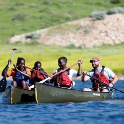 Margaret Mathew, 16, Farsilla Ahmed, 14, Ali Musse, 14, and Kevin Niepraschk, teen youth supervisor, canoe with SPLORE and others from the Sunnyvale Community Center at Little Dell Reservoir on Friday, June 28, 2013.