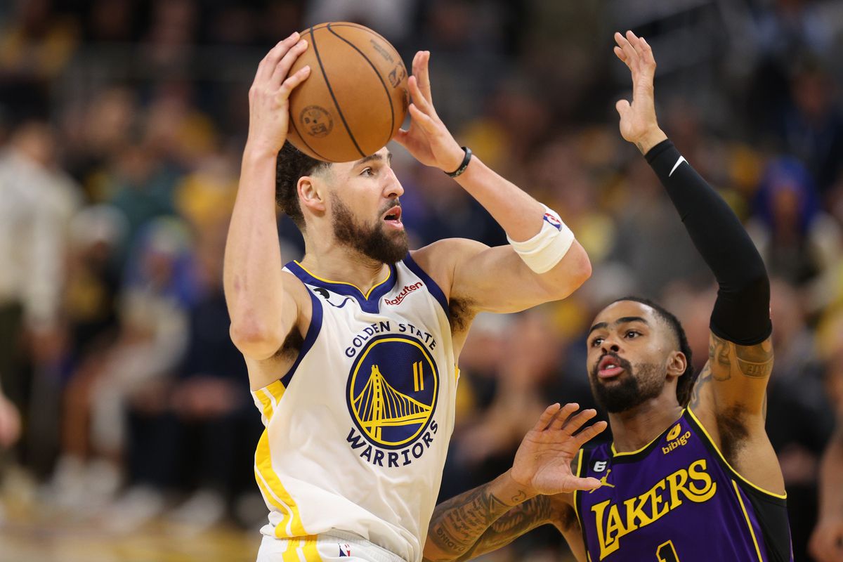 SAN FRANCISCO, CALIFORNIA - MAY 04: Klay Thompson #11 of the Golden State Warriors drives against D’Angelo Russell #1 of the Los Angeles Lakers during the fourth quarter in game two of the Western Conference Semifinal Playoffs at Chase Center on May 04, 2023 in San Francisco, California.