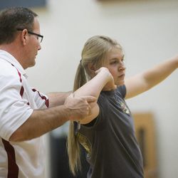 Amarissa Hawker works with her coach Darin Beierle on Friday, Jan. 16, 2015, at Herriman High School. Amarissa is a track athlete who was diagnosed with diabetes and then turned to cutting because she was depressed.