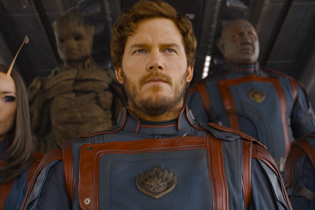 (L-R): Pom Klementieff as Mantis, Groot (voiced by Vin Diesel), Chris Pratt as Peter Quill/Star-Lord, Dave Bautista as Drax, Karen Gillan as Nebula in Marvel Studios’ Guardians of the Galaxy Vol. 3. It’s a shot of them from the chests up as they walk down a ship’s gangplank in their Guardians uniforms. 