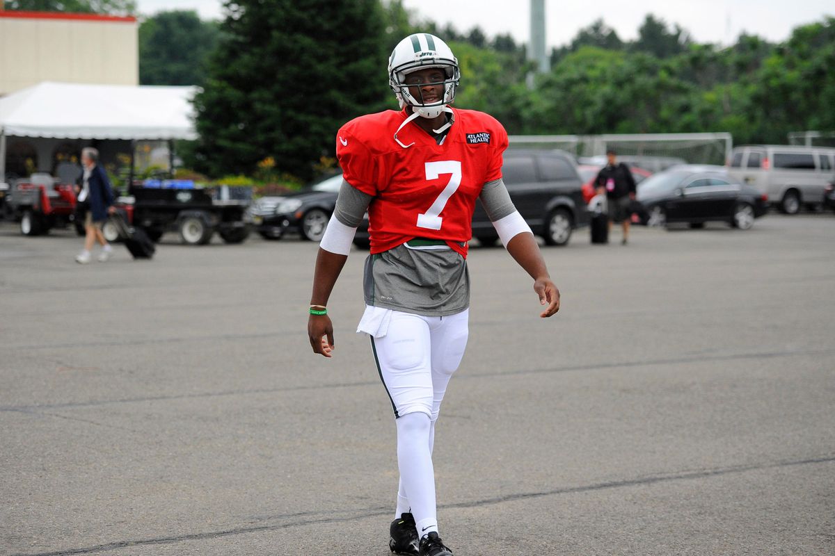 Geno Smith, shown here, gasping for air on the walk to his car.