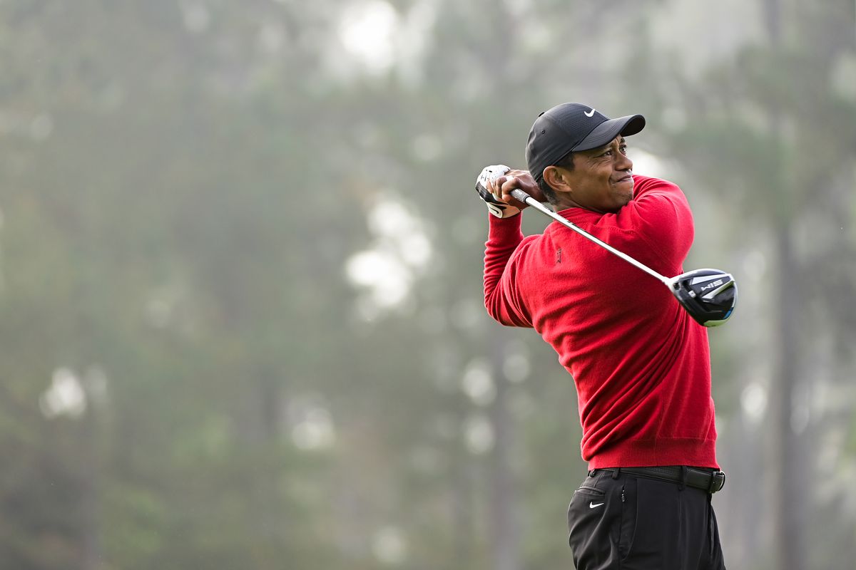 Masters champion Tiger Woods plays his stroke from the No. 1 tee during Round 4 of the Masters at Augusta National Golf Club, Sunday, November 15, 2020.