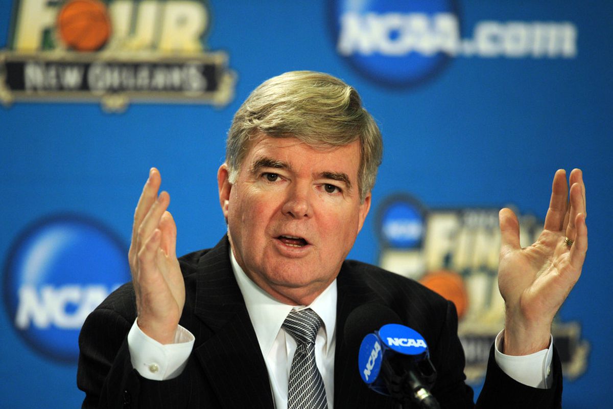 If Mark Emmert's hand gesture in this photo were meant to estimate how full of 'hot air' he is, it would still be a very conservative figure. Mandatory Credit: Tyler Kaufman-US PRESSWIRE