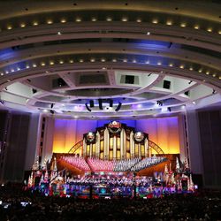 The Mormon Tabernacle Choir performs with Santino Fontana and the "Sesame Street" Muppets during its annual Christmas concert in Salt Lake City Thursday, Dec. 11, 2014. 