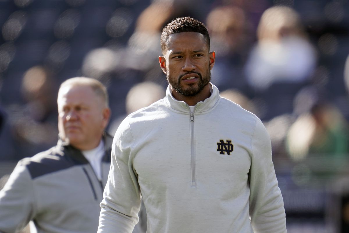 New Notre Dame coach Marcus Freeman will lead the Fighting Irish against Oklahoma State in the Fiesta Bowl. 