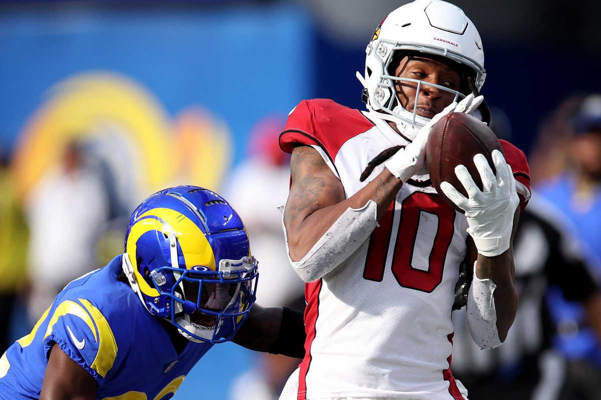 DeAndre Hopkins #10 of the Arizona Cardinals makes a catch in front of David Long Jr. #22 of the Los Angeles Rams during a 27-17 win at SoFi Stadium on November 13, 2022 in Inglewood, California.
