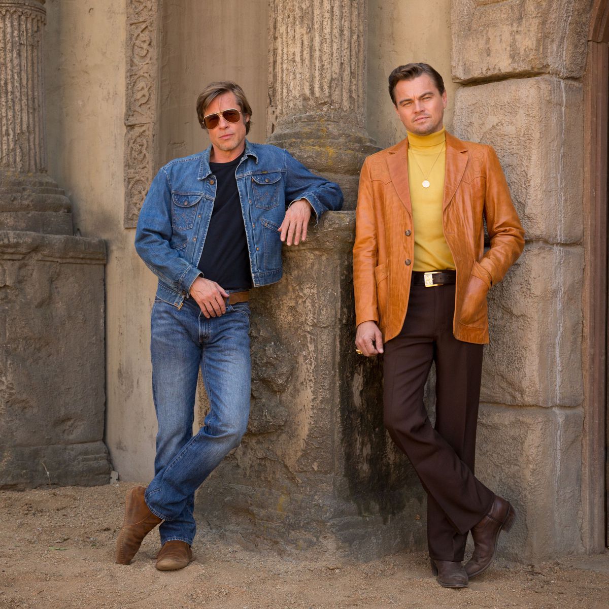 Cliff and Rick pose against a wall.