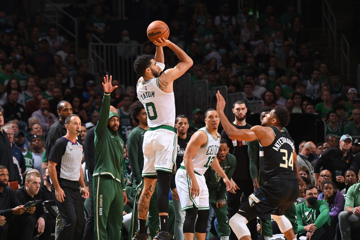 Jayson Tatum #0 of the Boston Celtics shoots a three point basket against the Milwaukee Bucks during the 2022 NBA Playoffs Eastern Conference Semifinals on May 15, 2022 at the TD Garden in Boston, Massachusetts.