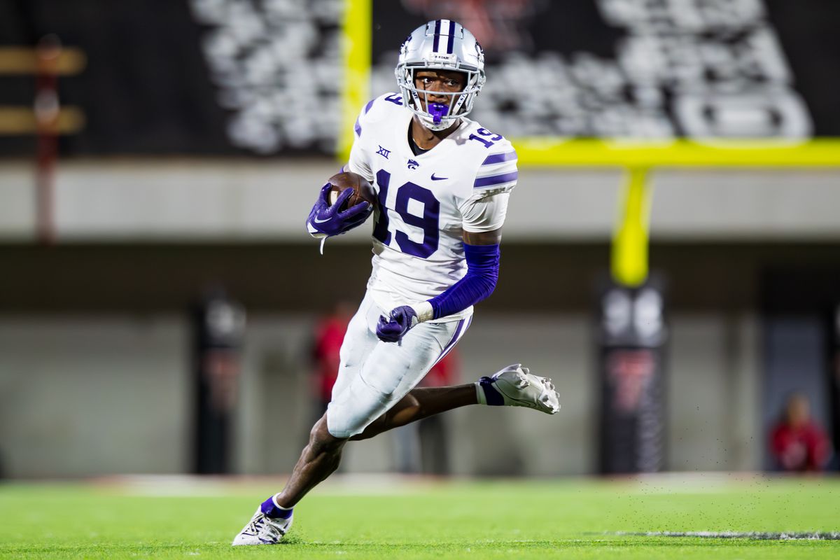 LUBBOCK, TEXAS - OCTOBER 14: VJ Payne #19 of the Kansas State Wildcats runs the ball after intercepting a pass during the second half of the game against the Texas Tech Red Raiders at Jones AT&amp;T Stadium on October 14, 2023 in Lubbock, Texas.
