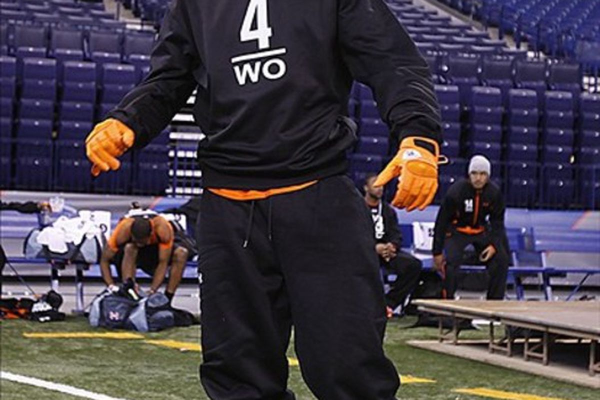 Feb 26, 2012; Indianapolis, IN, USA; Oklahoma State Cowboys wider receiver Justin Blackmon loosens up before the drills start for the NFL Combine at Lucas Oil Stadium. Mandatory Credit: Brian Spurlock-US PRESSWIRE