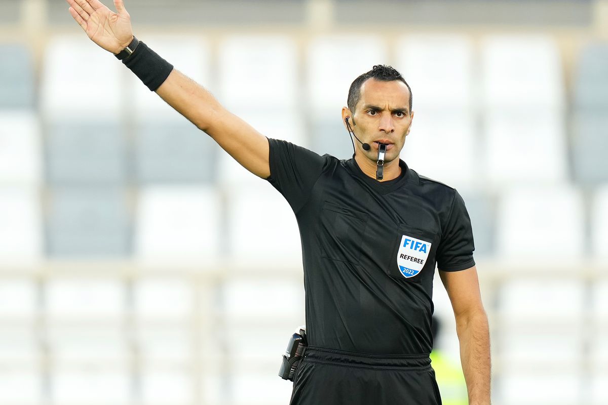 Match Referee, Mustapha Ghorbal signals the first goal scored by Maximiliano Meza of CF Monterrey (not pictured) will stand during the FIFA Club World Cup UAE 2021 5th Place Match match between CF Monterrey and Al Jazira at Al Nahyan Stadium on February 09, 2022 in Abu Dhabi, United Arab Emirates.