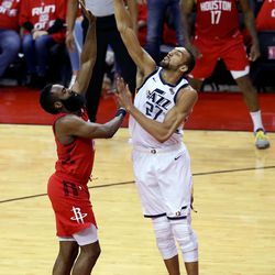 Houston Rockets guard James Harden (13) is blocked by Utah Jazz center Rudy Gobert (27) during Game 5 of a first-round NBA basketball playoff series in Houston on Wednesday, April 24, 2019.