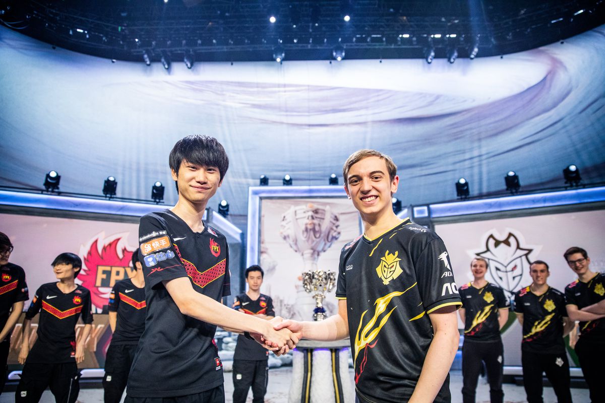 The FunPlus Phoenix and G2 Esports team captains shake hands 
