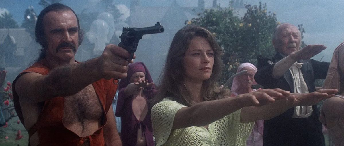 Charlotte Rampling stands with her arms out in front of her face, while Sean Connery stands next to her pointing his gun away from the screen