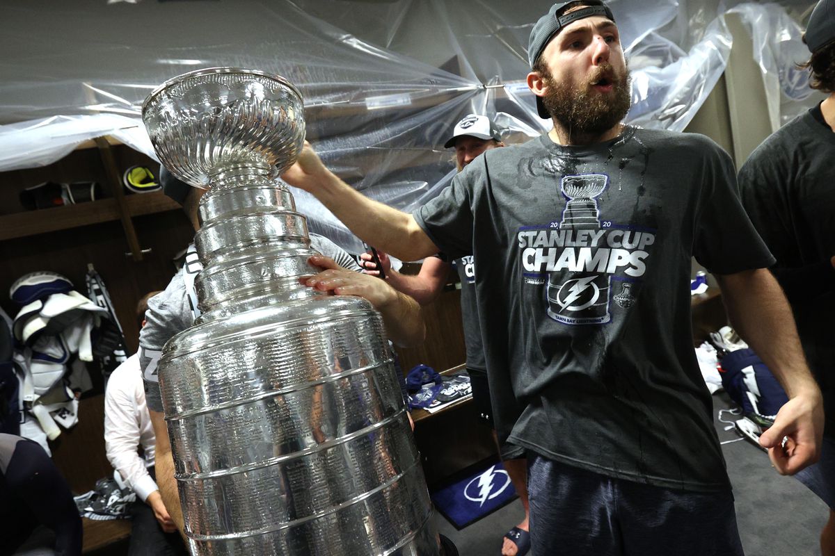 Barclay Goodrow #19 of the Tampa Bay Lightning celebrates with the Stanley Cup in the locker room after the Tampa Bay Lightning defeated the Dallas Stars 2-0 in Game Six of the NHL Stanley Cup Final to win the best of seven game series 4-2 at Rogers Place on September 28, 2020 in Edmonton, Alberta, Canada.
