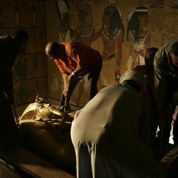 In this Sunday, Nov. 4, 2007 file photo, the sarcophagus of King Tut is placed back in his underground tomb in the famed Valley of the Kings in Luxor, Egypt.