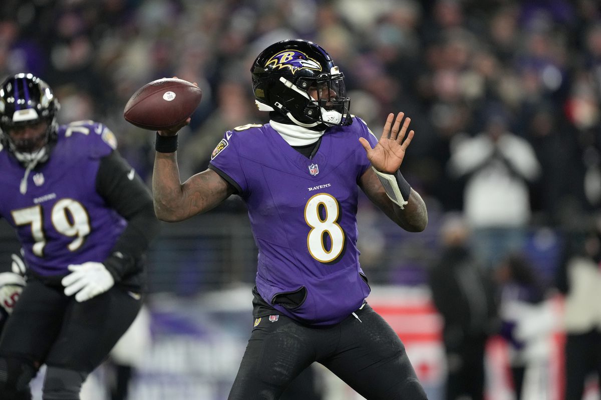 Quarterback Lamar Jackson #8 of the Baltimore Ravens throws the ball in the AFC Divisional Playoff game against the Houston Texans at M&amp;T Bank Stadium on January 20, 2024 in Baltimore, Maryland. The Ravens defeated the Texans 34-10.