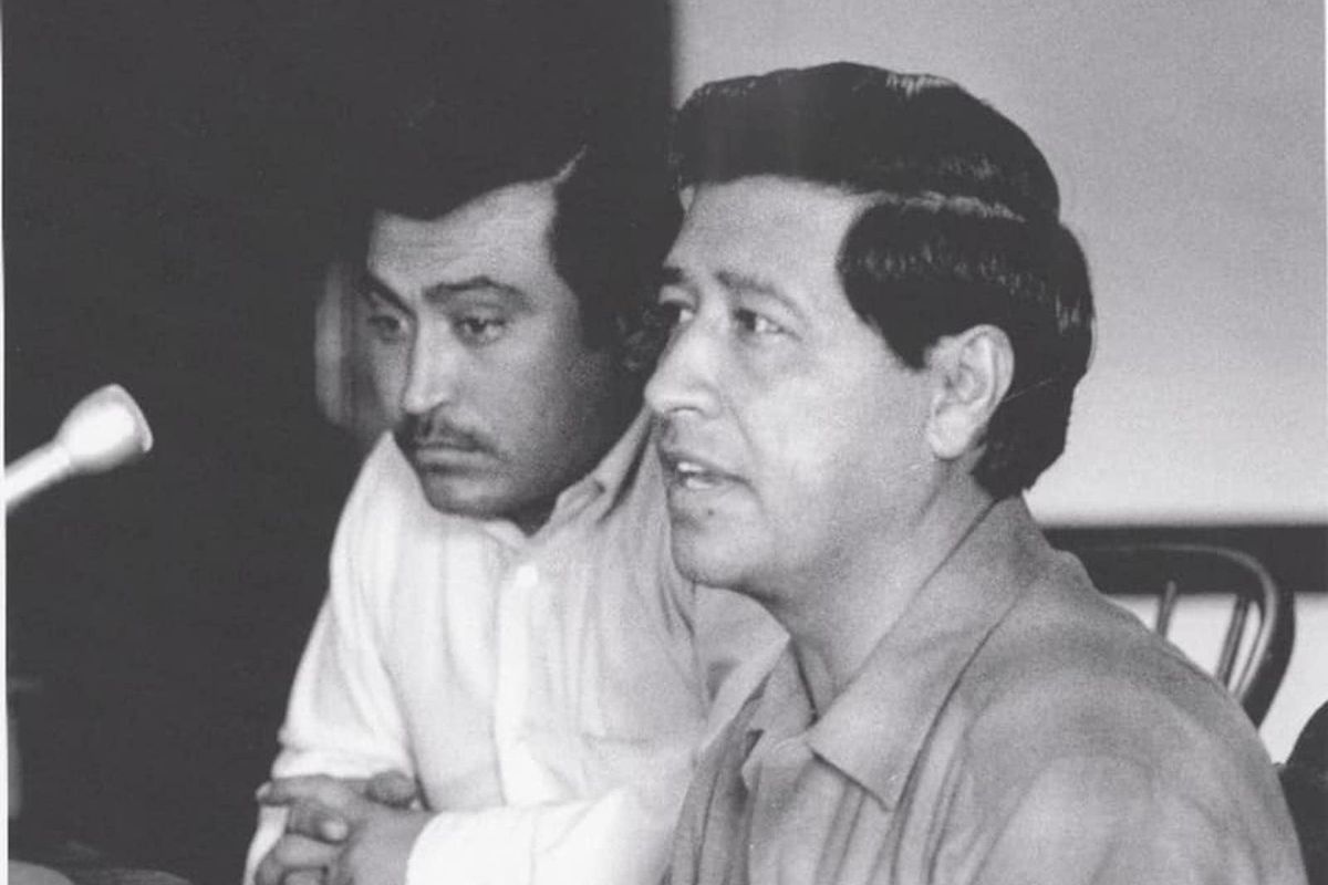 Marcos Muñoz (left) worked with Cesar Chavez, a founder of the United Farm Workers, for better conditions for laborers.