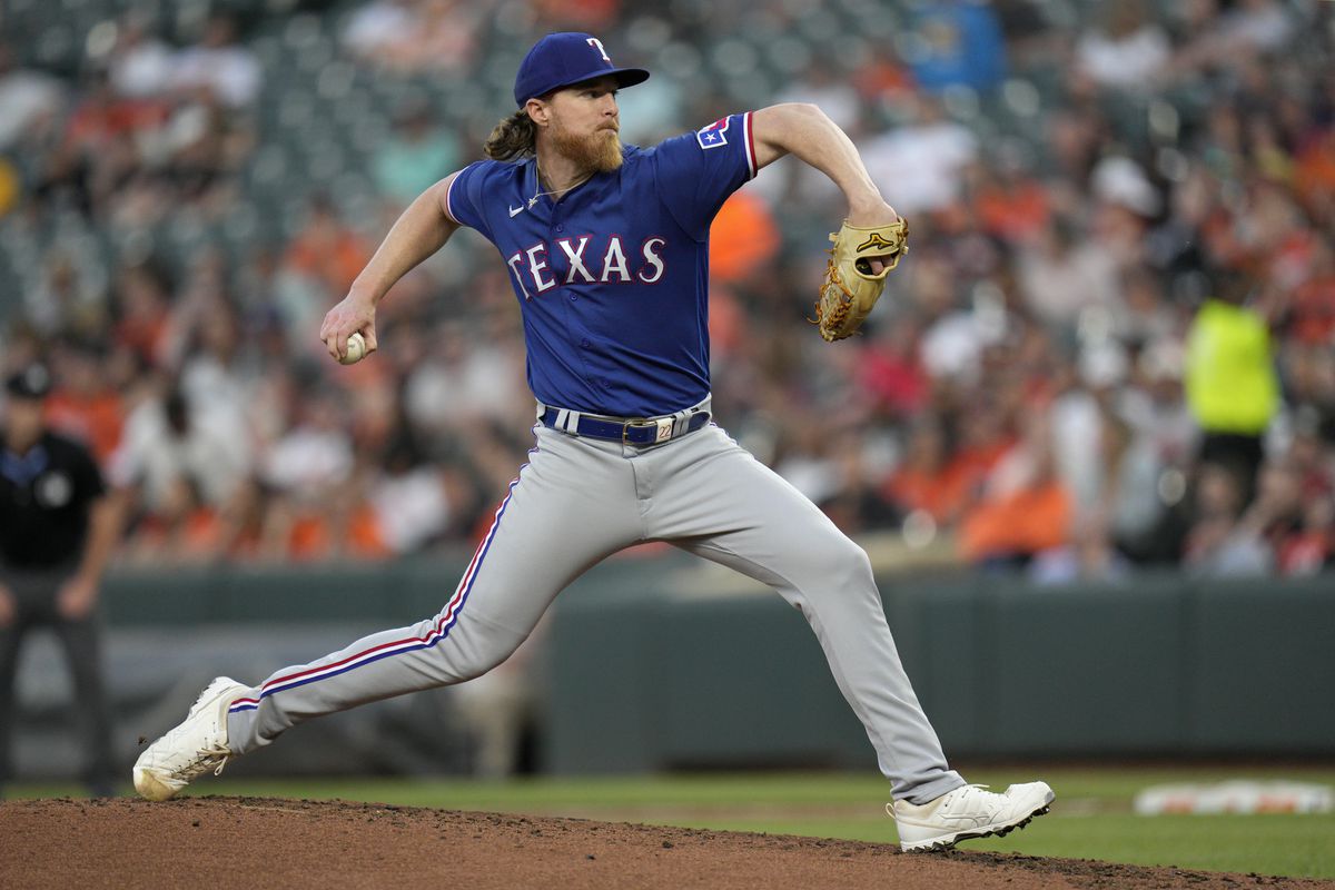 Jon Gray #22 of the Texas Rangers pitches against the Baltimore Orioles during the third inning at Oriole Park at Camden Yards on May 26, 2023 in Baltimore, Maryland.