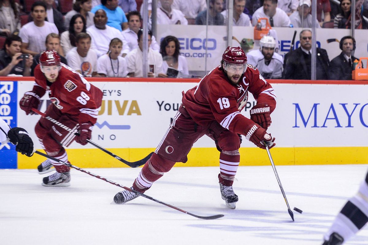 May 15, 2012; Glendale, AZ, USA; Phoenix Coyotes right wing Shane Doan (19) carries the puck during game two of the Western Conference finals of the 2012 Stanley Cup Playoffs at Jobing.com Arena.  Mandatory Credit: Matt Kartozian-US PRESSWIRE