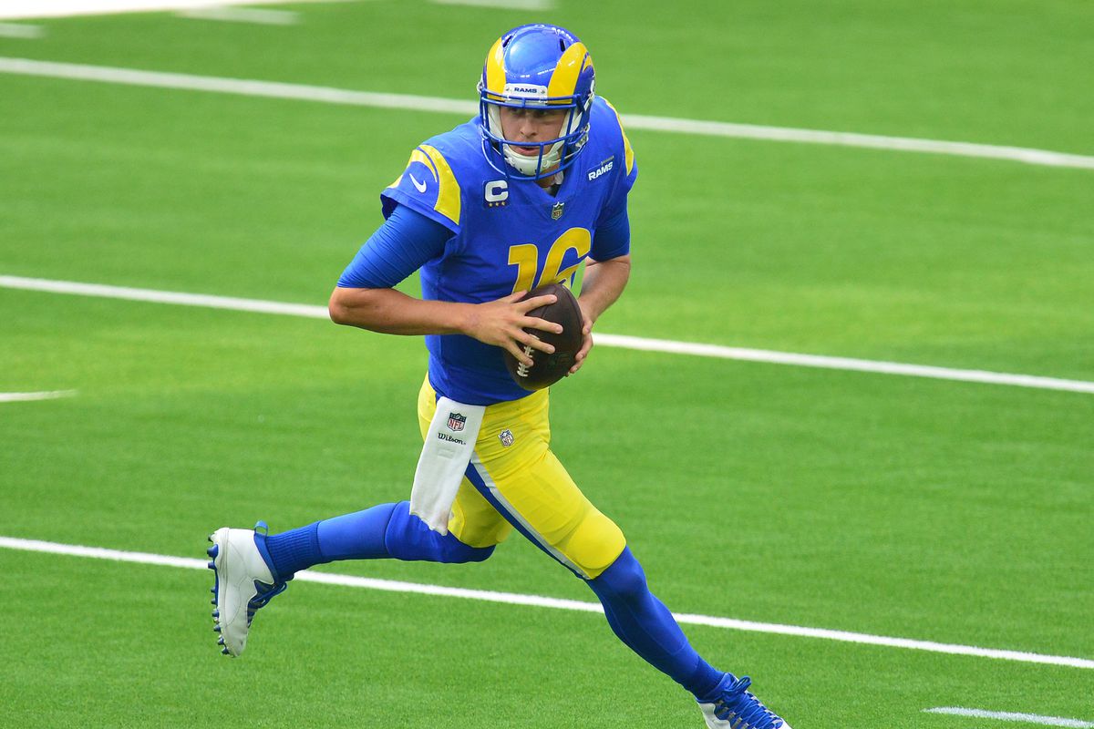 Los Angeles Rams quarterback Jared Goff (16) moves out to pass against the New York Giants during the first half at SoFi Stadium.&nbsp;