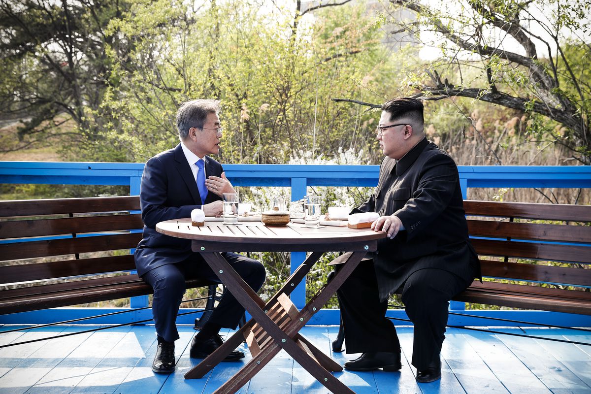 North Korean leader Kim Jong Un (right) and South Korean President Moon Jae-in (left) speak in private during the Inter-Korean Summit in Panmunjom, South Korea, on April 27, 2018.
