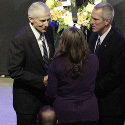 Lt. Gov. Greg Bell, left, greets Christy Ivie at the funeral of her husband, U.S. Border Patrol agent Nicholas J. Ivie, at Utah Valley University in Orem, Thursday, Oct. 11, 2012.