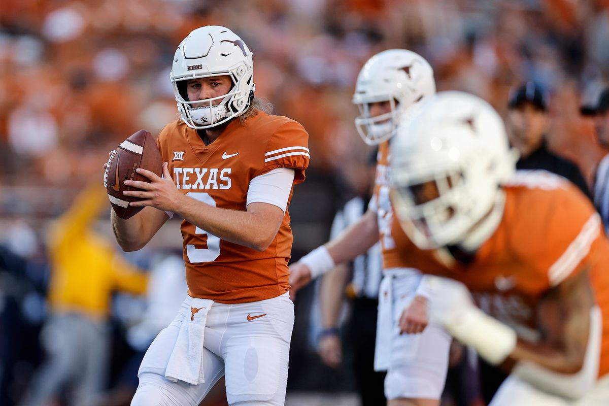 Quinn Ewers of the Texas Longhorns warms up before the game against the West Virginia Mountaineers at Darrell K Royal-Texas Memorial Stadium on October 01, 2022 in Austin, Texas.