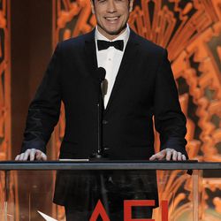 In this June 7, 2012 file photo, John Travolta attends the AFI Life Achievement Award Honoring Shirley MacLaine at Sony Studios in Culver City, Calif. Since strutting onto the big screen in "Saturday Night Fever," John Travolta"™s career has been one of dramatic ups and downs, from comeback king to Internet meme. Travolta, 61, is prepping a handful of projects and ahead of the release of an explosive documentary on Scientology that focuses considerably on Travolta"™s relationship with the organization.